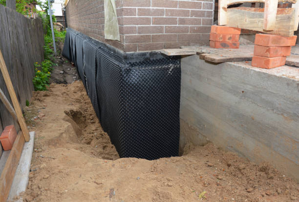 Happy homeowners after waterproofing job in Sea Girt